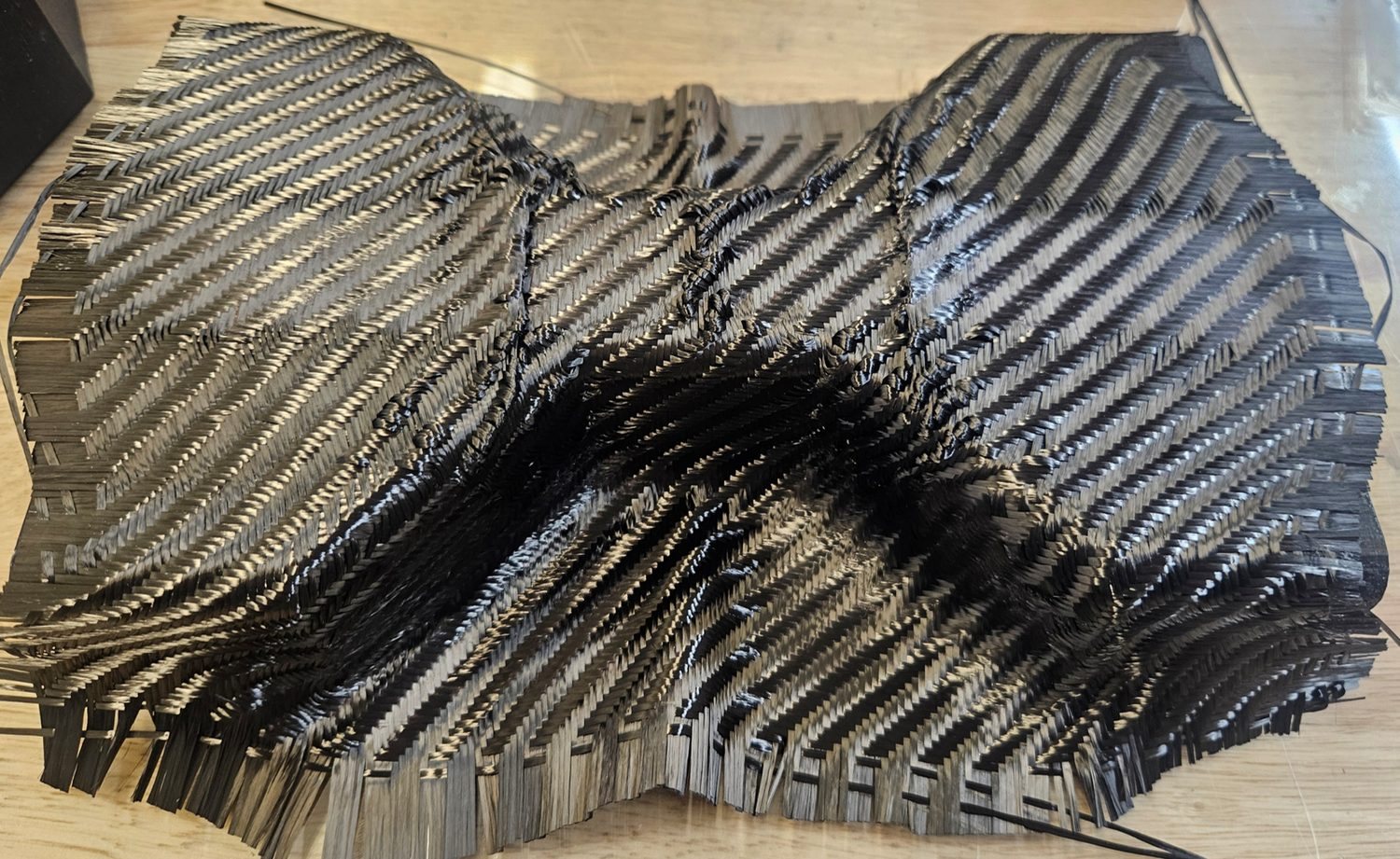 Using fast simulations to guide patches for automated fabric forming